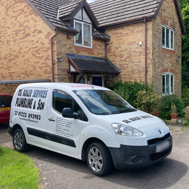 The white Plumbline & Son van, lettered Oil Boiler Services, parked outside a brick house